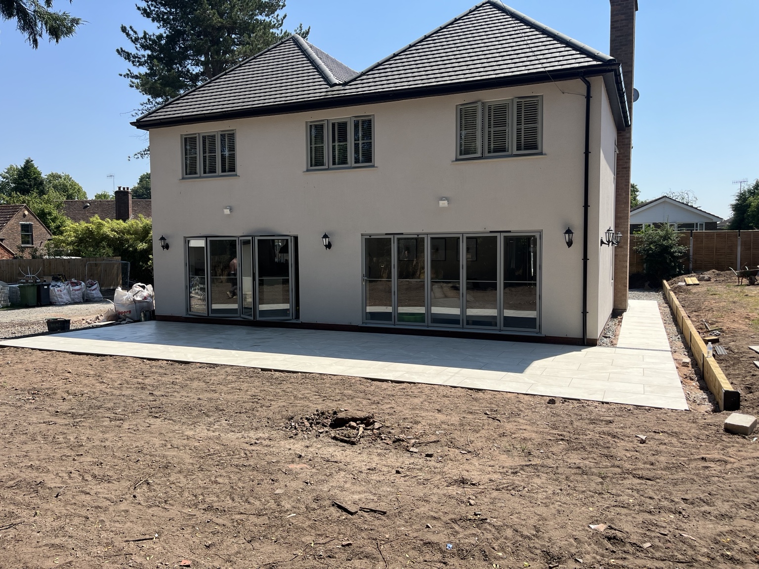 Wide view of a large porcelain patio installed by ProEdge